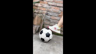 Girl plays with a ball