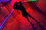 Between the darkness and the neon lights…