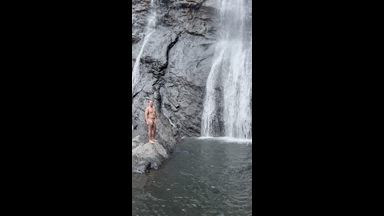 I jump naked into a waterfall