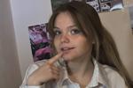 Finger on lips
