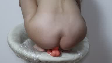 Dildo in Ass on a bar Stool