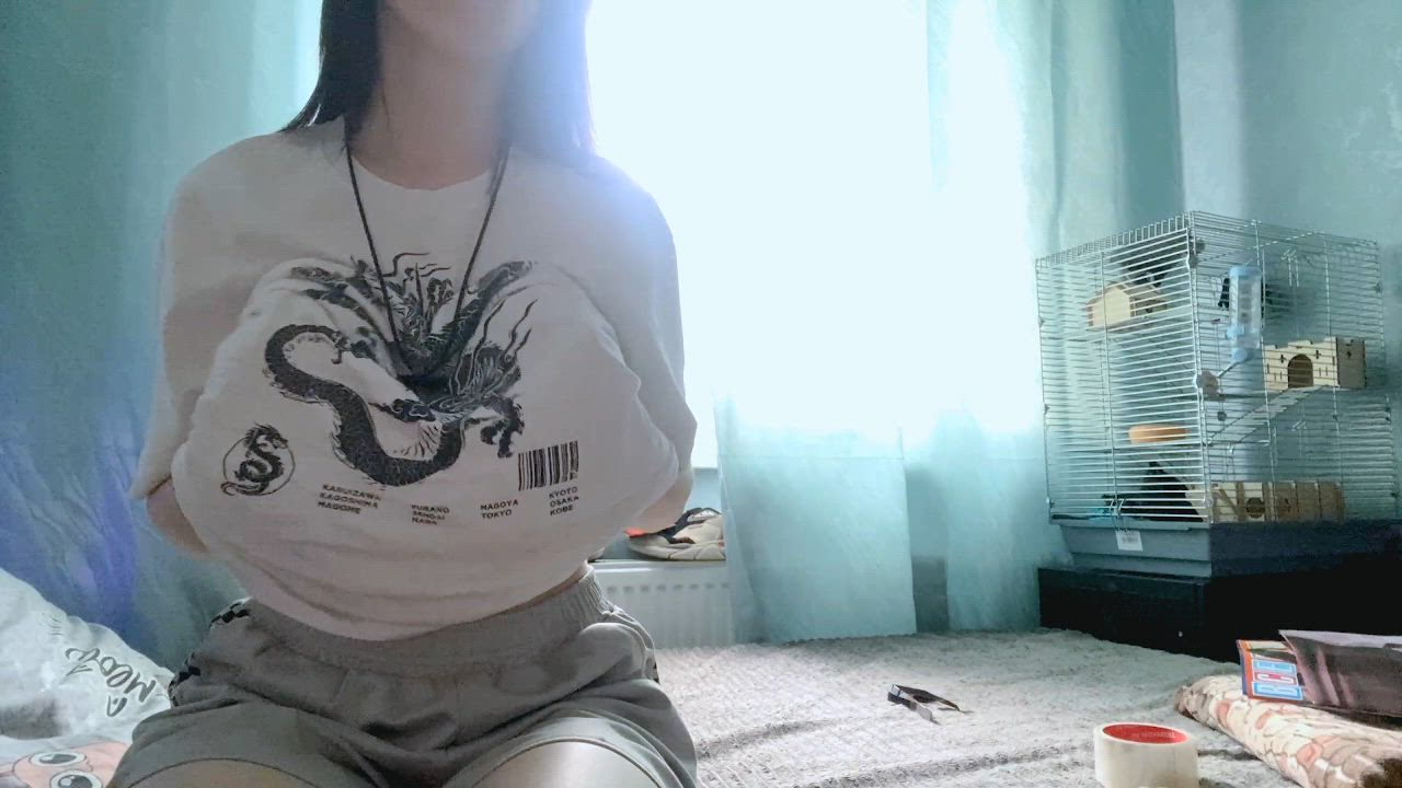 Gentle massage my breasts under top