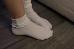 My feet in ruffle socks