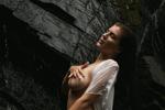 under the waterfall