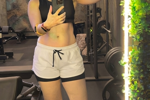 Hot fit girl flexing her firm muscles