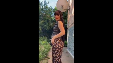 In brown leather and leopard