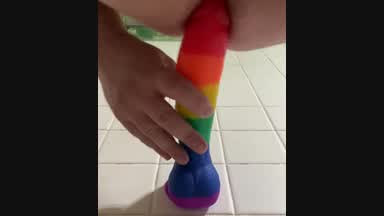 Riding a dildo