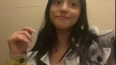 Hilary in a public restroom