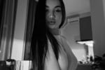 Black & white side pose (bedroom)