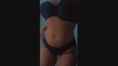 Full body view in black lingerie set