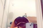 Arched over in the mirror