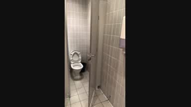 Wanking in public toilet