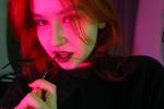 Red-haired girl in red
