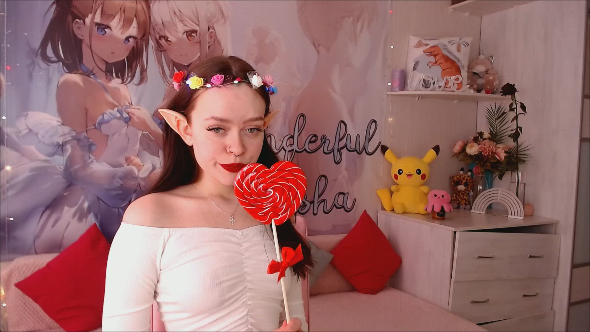 Elf licking a lollipop