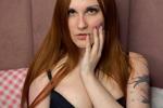 your redhead in black stockings