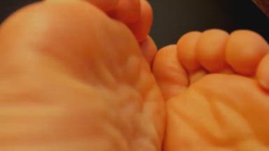 Surrounded by wrinkled soles