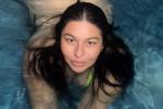 A naughty girl in the pool