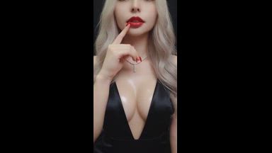 Red lips and breasts with oil