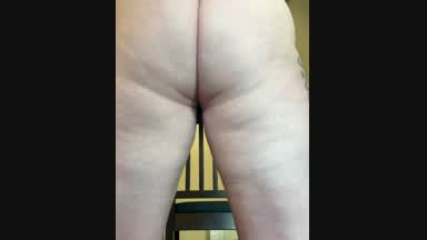 Squatting in a Thong