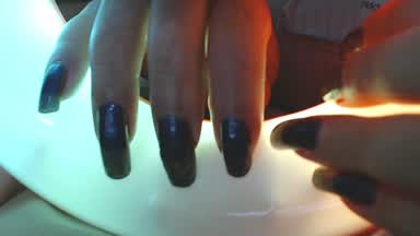 Nails dark polish...