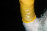 Yellow condom on