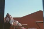 vintagedoll — Topless on the balcony