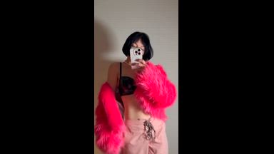 Pink fur. Sharp heels.