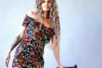 a chic lady in a floral dress