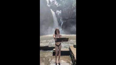 Funny tease at the waterfall