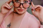 Naughty girl in glasses