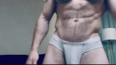 Muscle god posing and verbal dominating