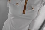 Standing in tight fitting shirt