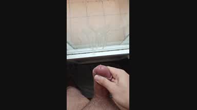 I cum in the window glass
