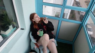 Smoking on balcony 2