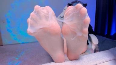 feet in white stockings with sperm imitation on it