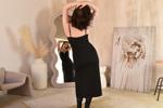 an elegant woman in a black dress