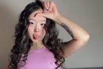 loser sign with pink clothes