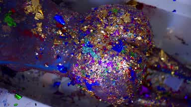 Sparks of all colors envelop me