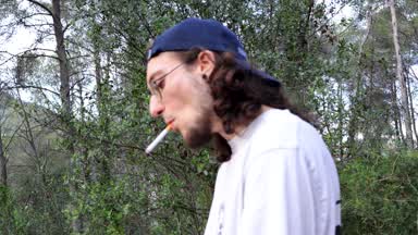 Smoking a Cigarette in the Woods