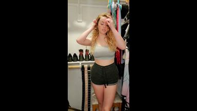 Trying on different outfits