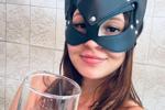 A mask, a glass of wine, and a spark of desire
