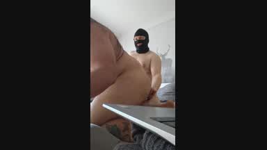 playing with the dildo and his ass.