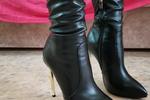naked in leather boots with heels