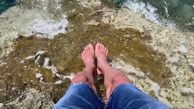 Male feet in Waves