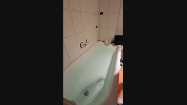 In Bathroom with Leatherpants