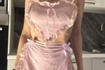 Housewife with pink apron