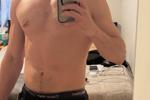 me shirtless wearing a backwards hat