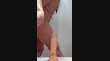 Jumping on a dildo