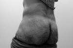 From behind