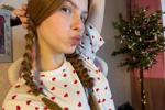 in cute pajamas and pigtails